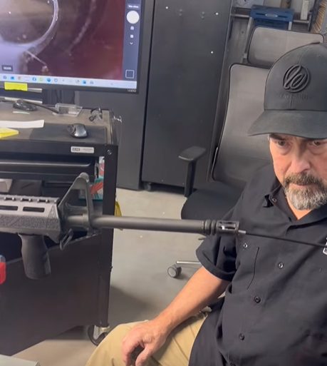 Mark, owner of Armed Gun Barn, at the gunsmithing bench